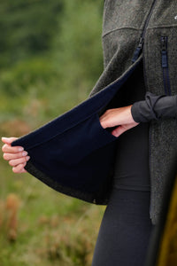 Women’s wool gilet in Moss Green stash pocket